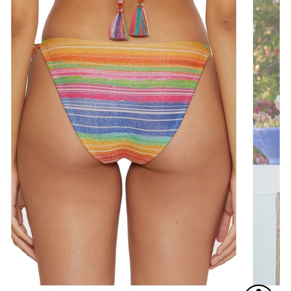 Selling this swimsuit. Never worn. Size Medium top and bottom. Reversible. - Picture 6 of 6